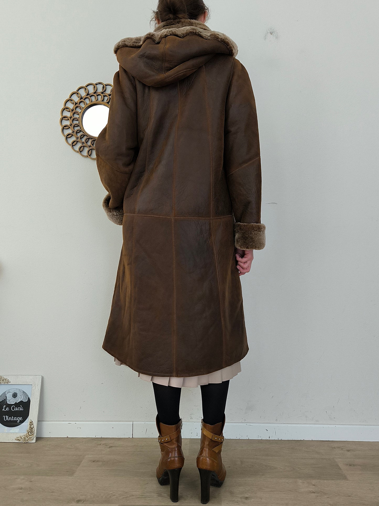 Cappotto in vera pelle lungo con cappuccio