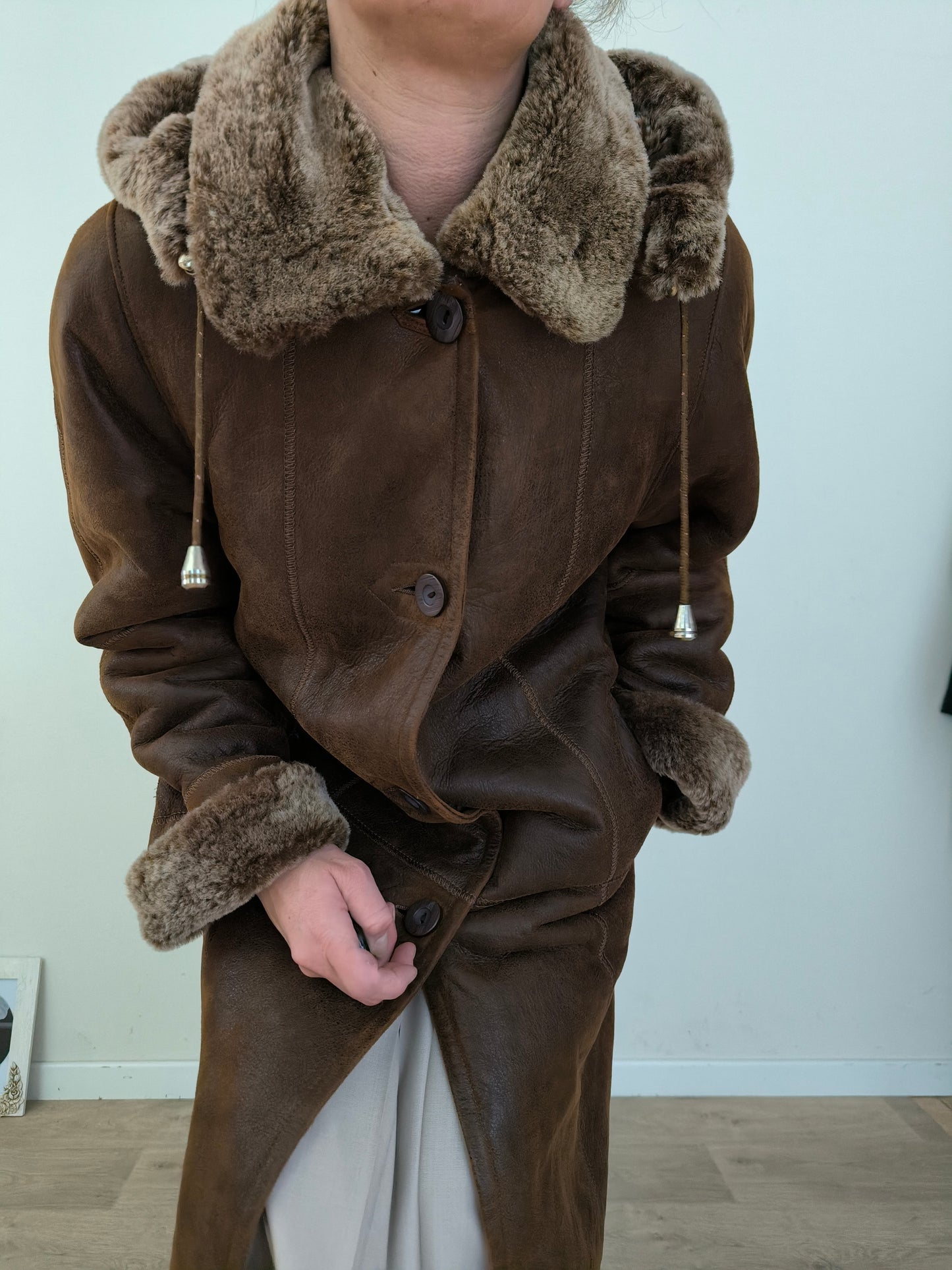 Cappotto in vera pelle lungo con cappuccio