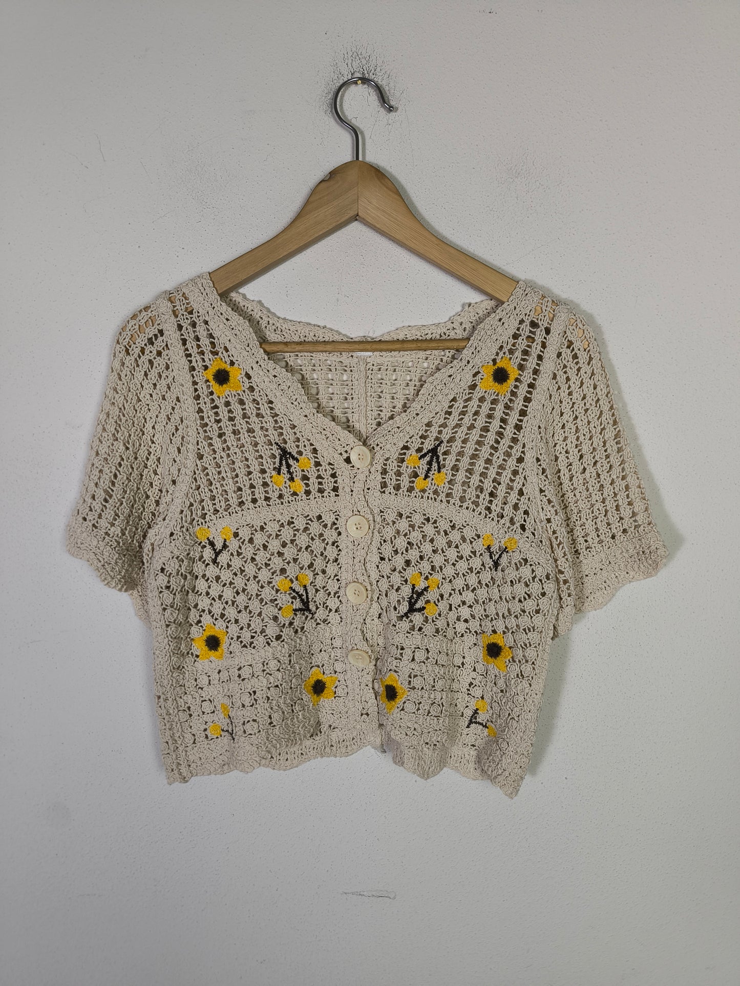 Giacchino crochet con fiori gialli