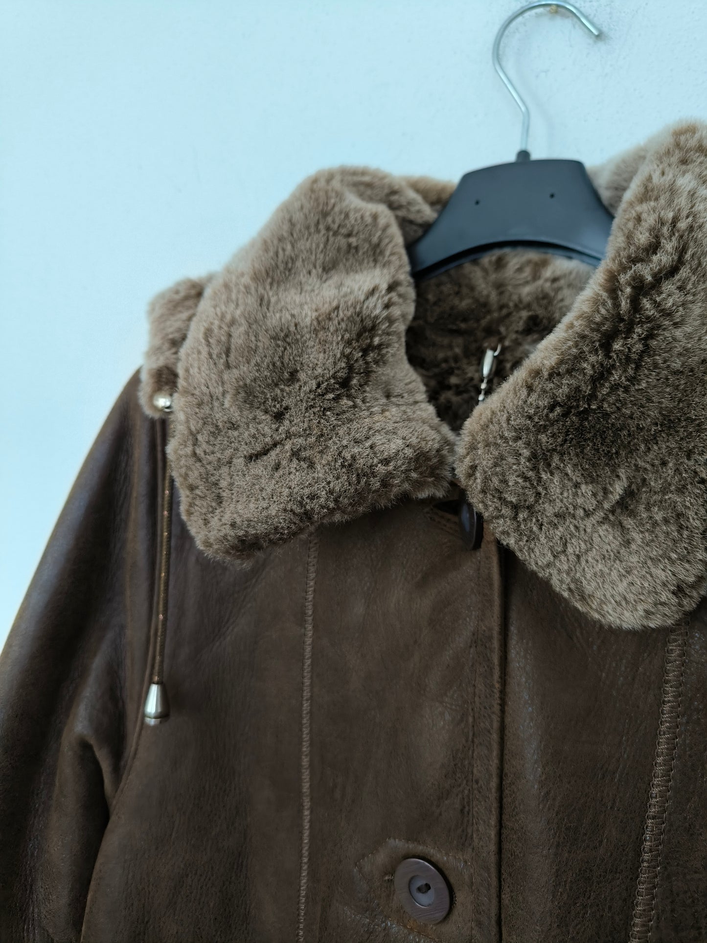 Cappotto in vera pelle lungo con cappuccio