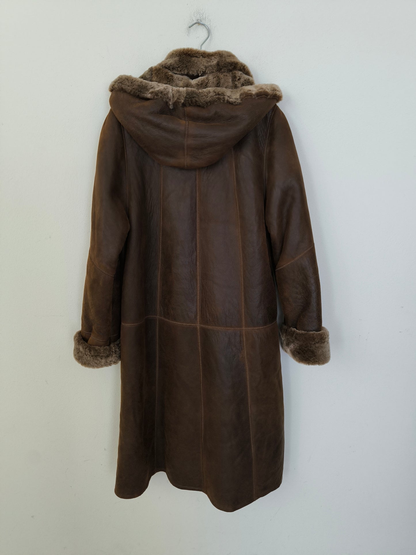 Cappotto in vera pelle lungo con cappuccio