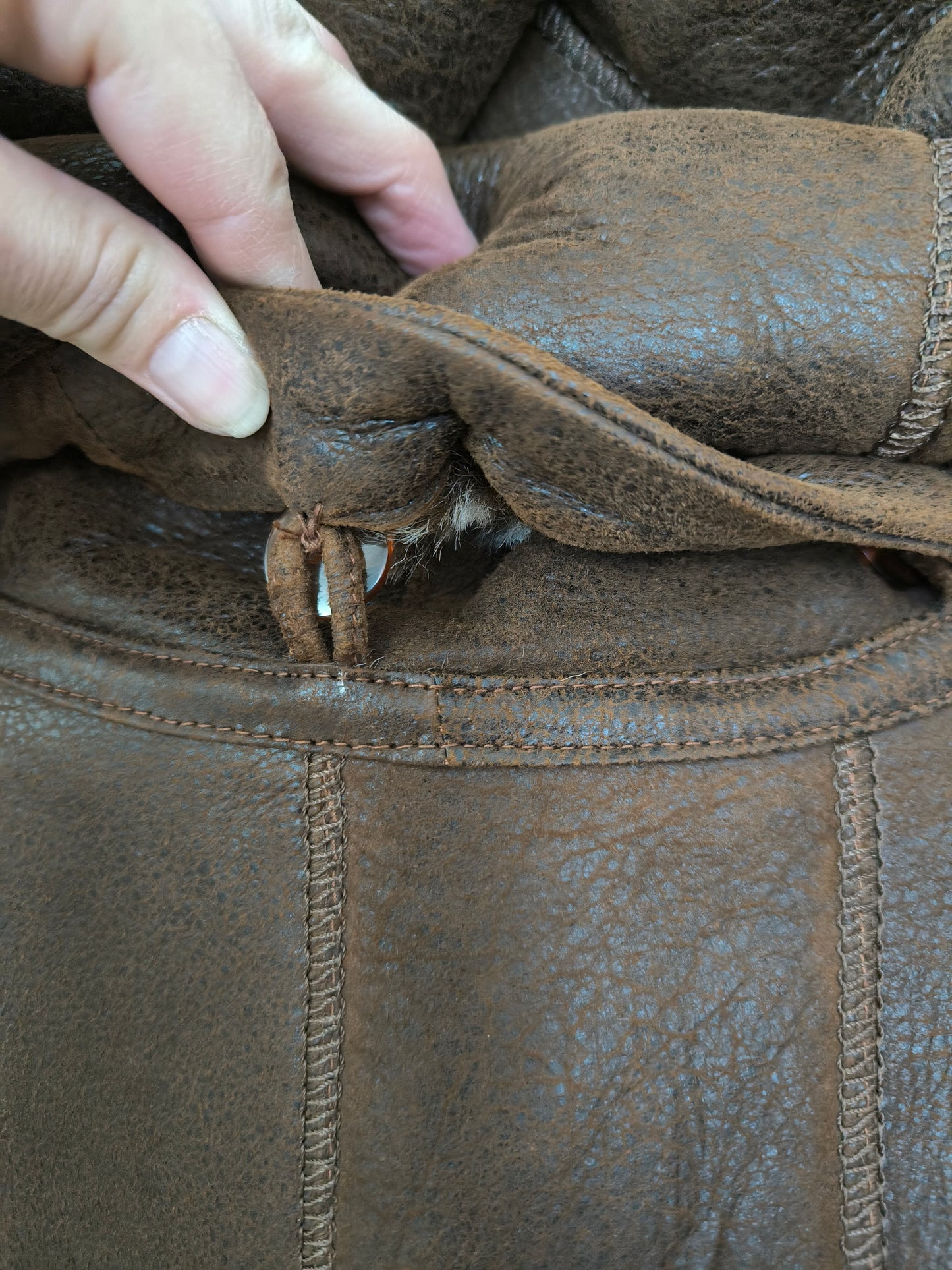 Cappotto in vera pelle lungo con cappuccio