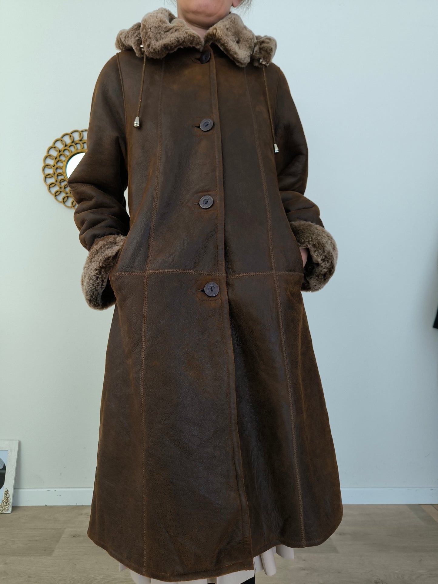 Cappotto in vera pelle lungo con cappuccio