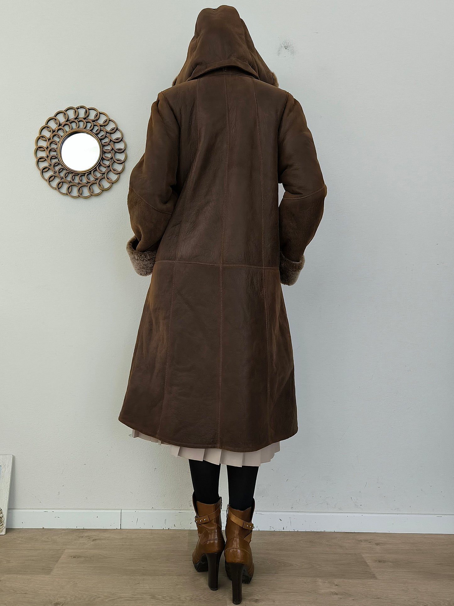 Cappotto in vera pelle lungo con cappuccio