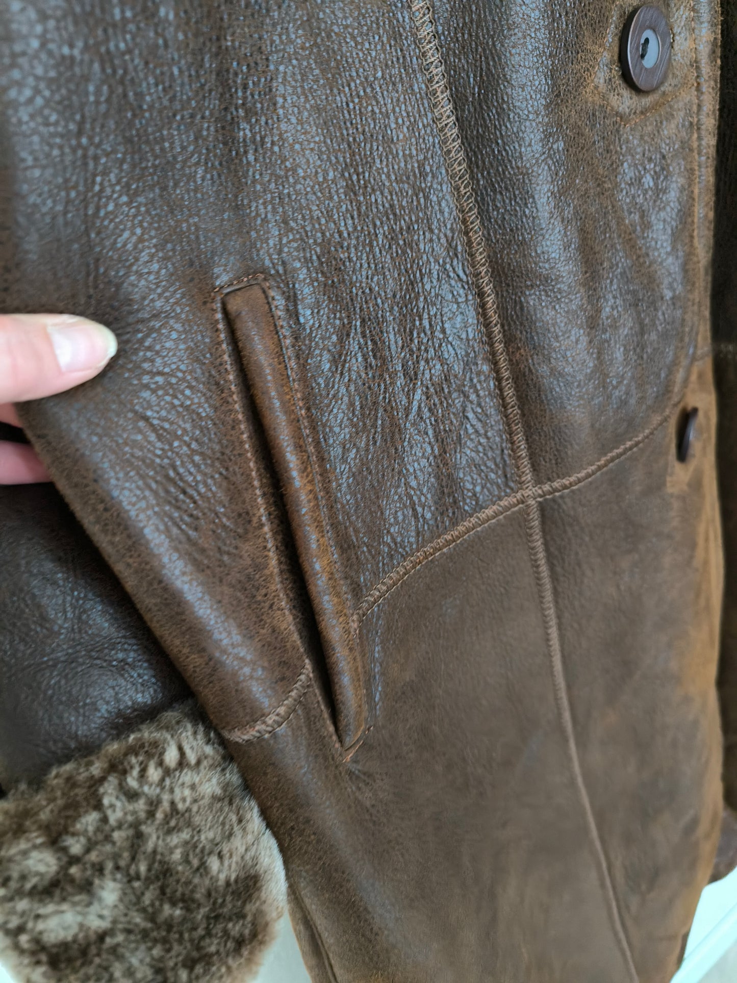 Cappotto in vera pelle lungo con cappuccio
