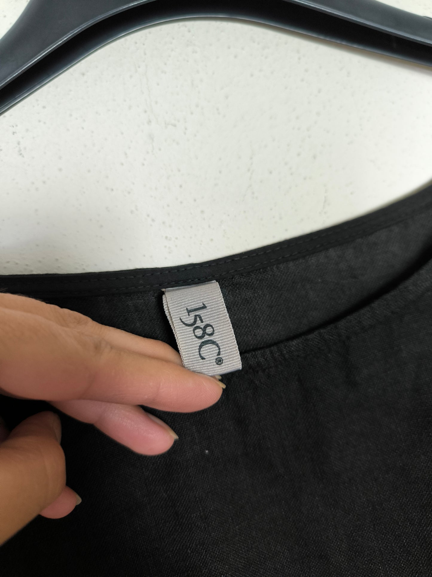 Blusa ampia in lino nero