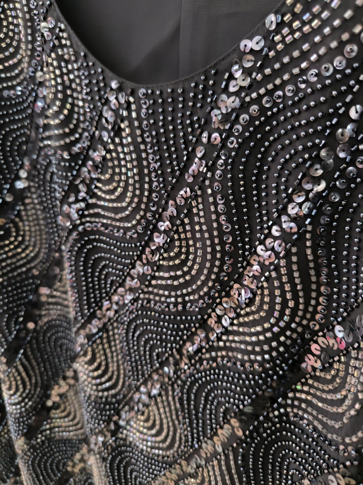 Blusa in paillettes antracite