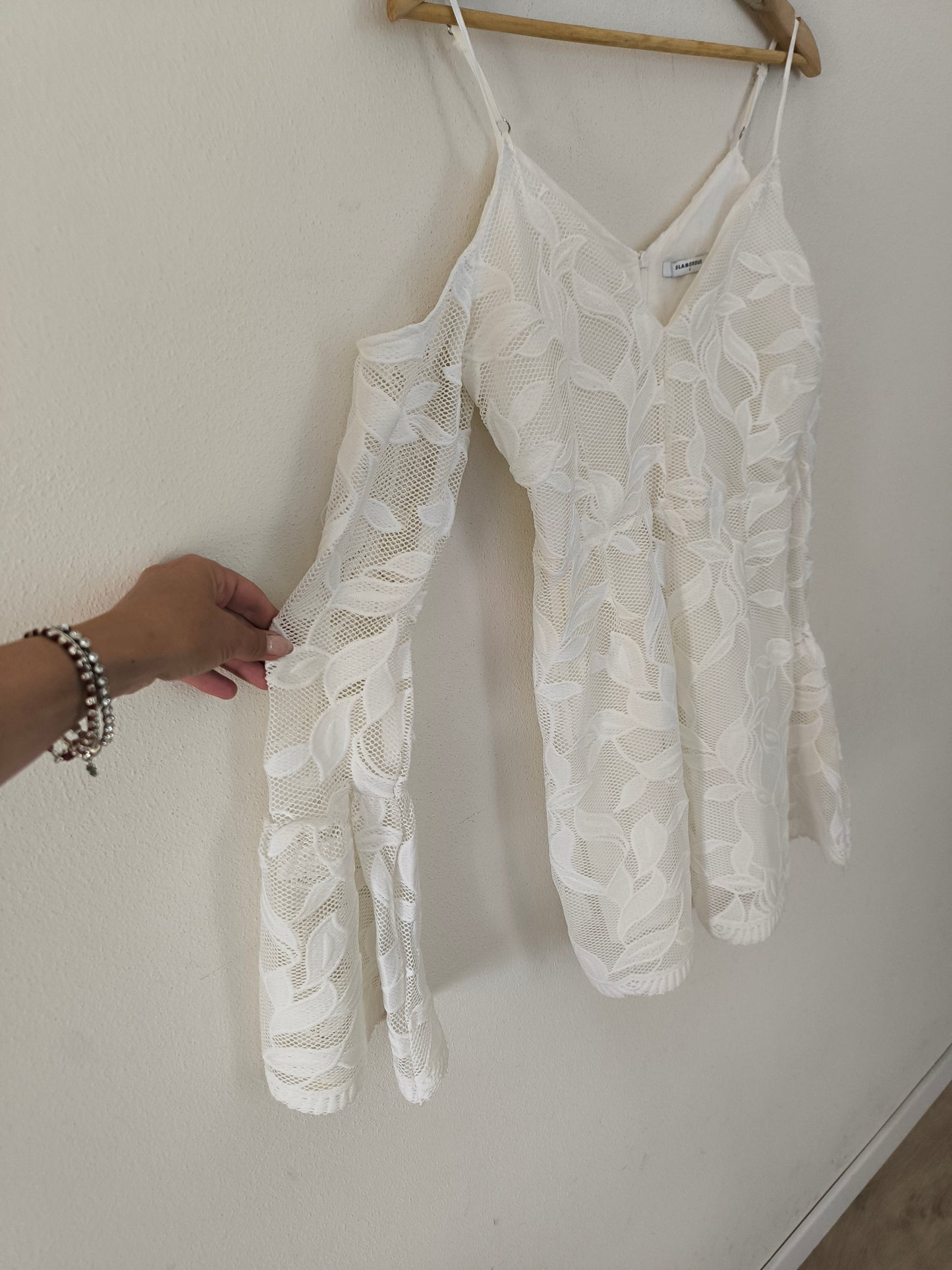 Mini jumpsuit in pizzo bianco
