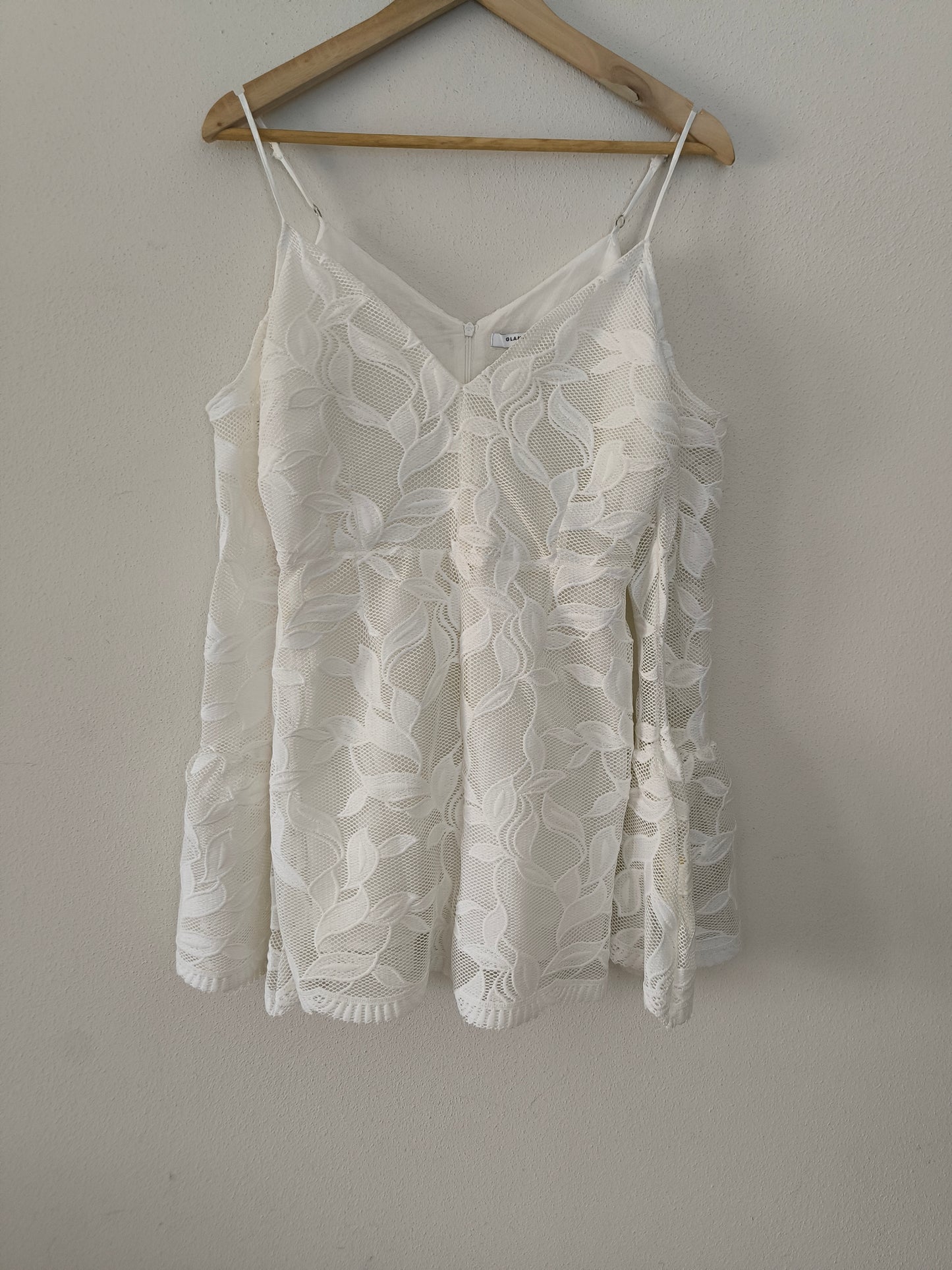 Mini jumpsuit in pizzo bianco